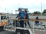 Safely into Essex and unloading the bikes off the trailer after our police escort through the tunnel